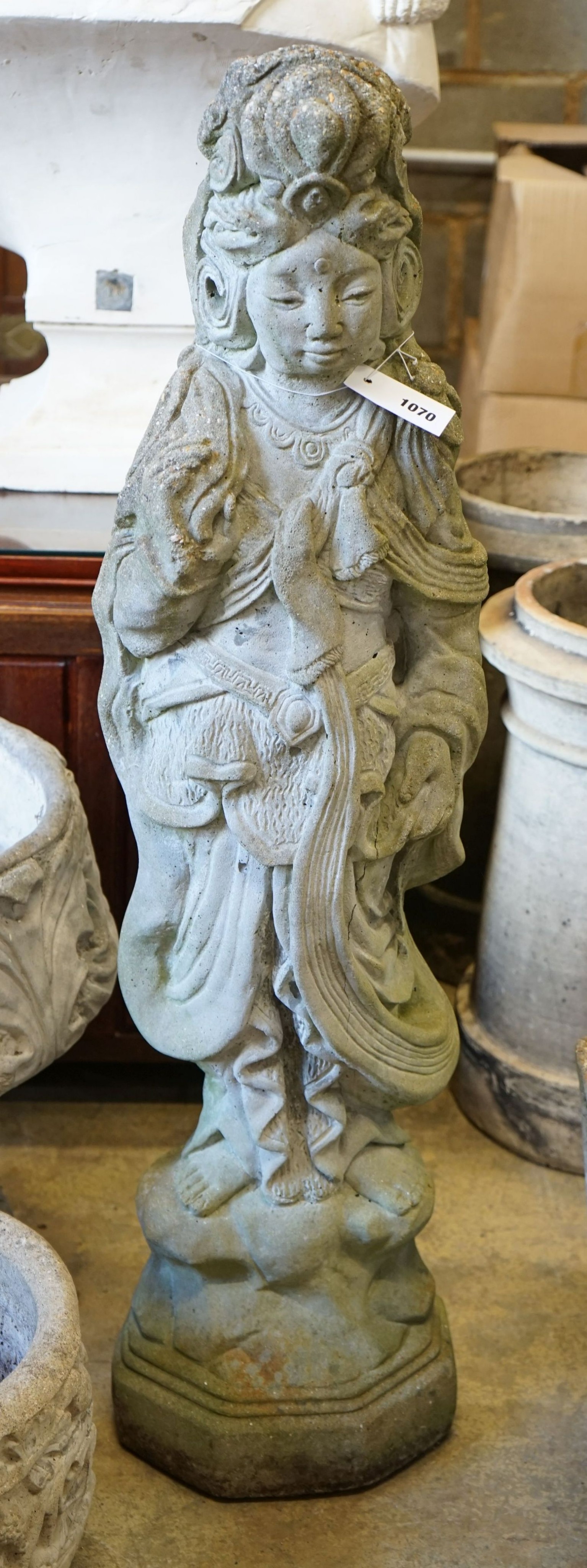A Chinese style reconstituted stone figural garden ornament, diameter 50cm, height 104cm
